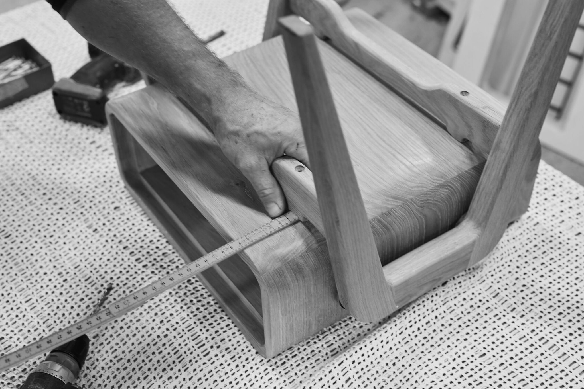 Final assembly of a raw nm11L nightstand in the workshop. nordlys møbler: HANDMADE - SCANDINAVIAN - FURNITURE from Norwegian oak.