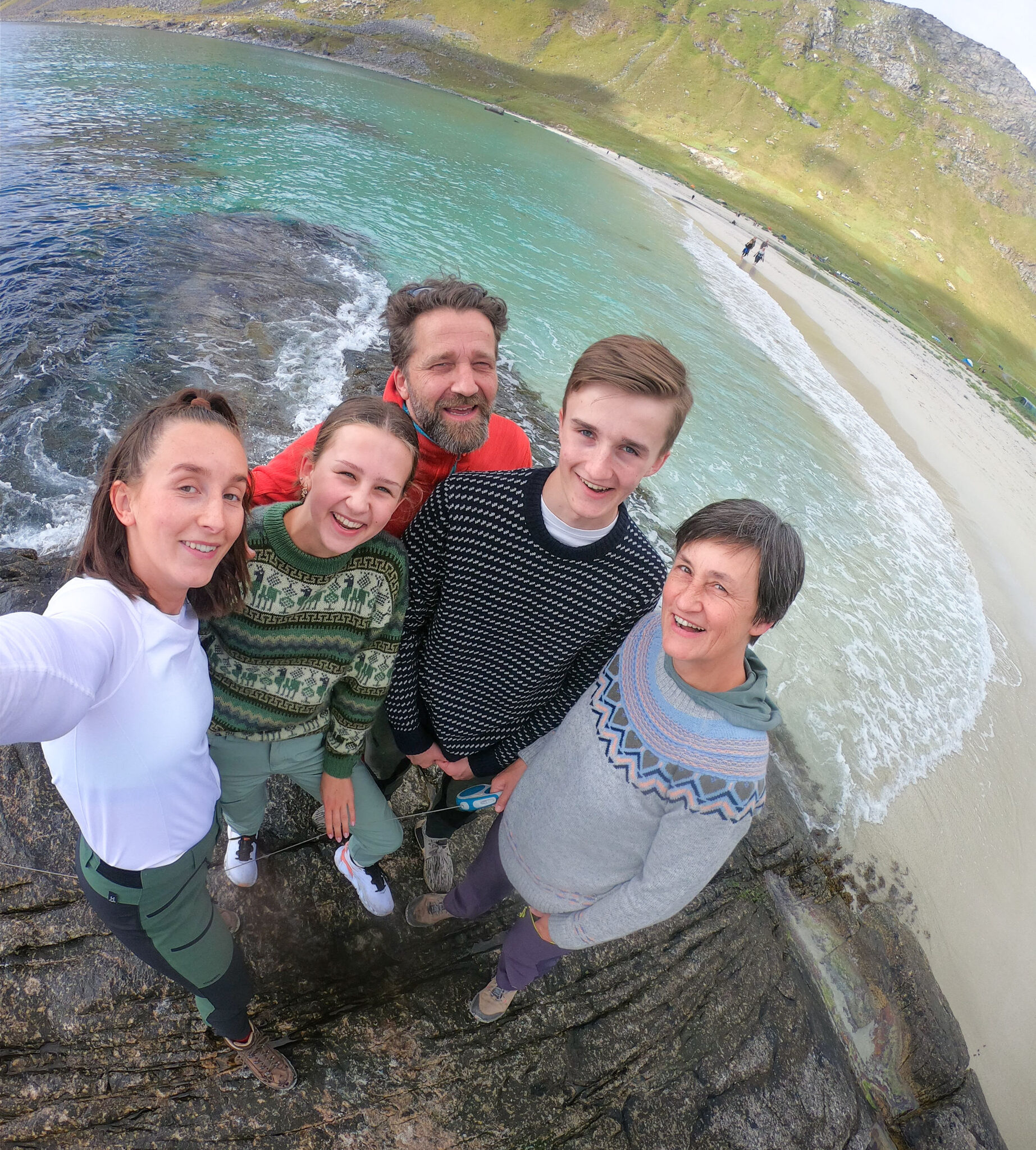 Family selfie on a Lofoten beach showing the strong backbone and team behind the brand. nordlys møbler: HANDMADE - SCANDINAVIAN - FURNITURE from Norwegian oak